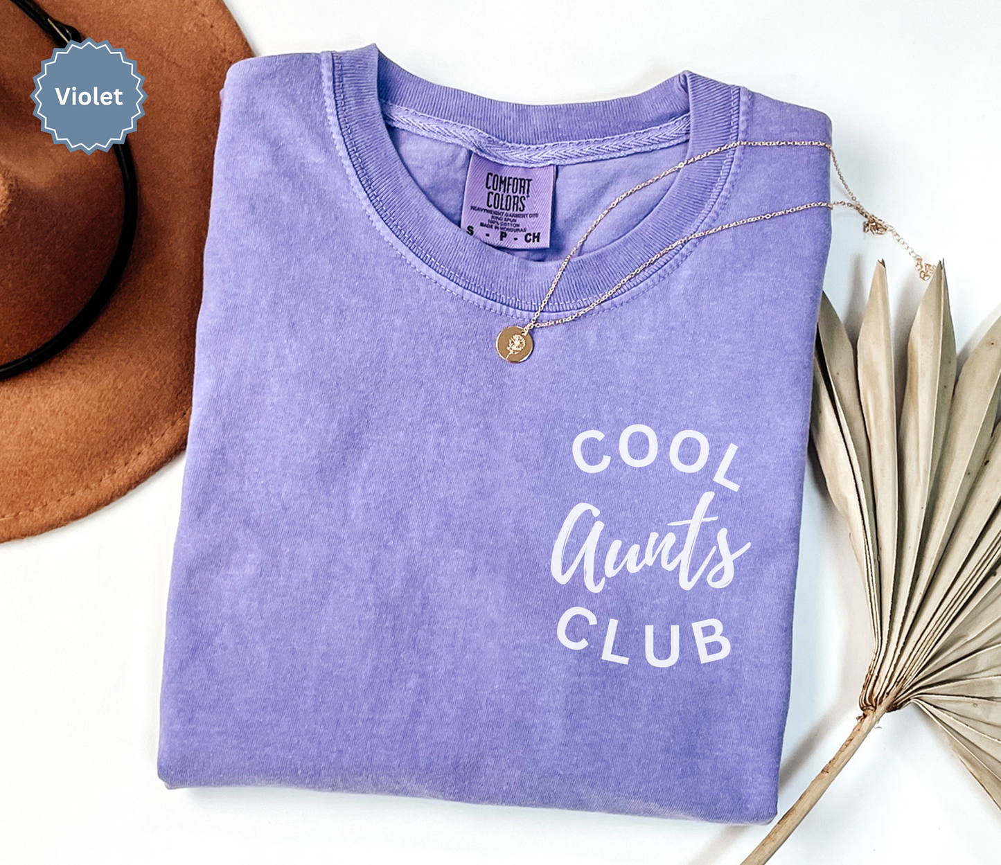 Comfort colors violet t-shirt with 'Cool Aunts Club' text on pocket.
