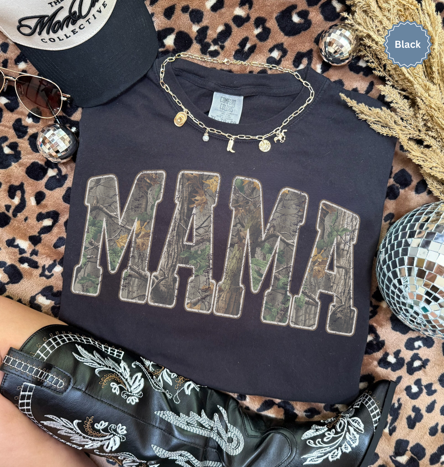Comfort colors Black t-shirt with distressed 'MAMA' in camo print text.