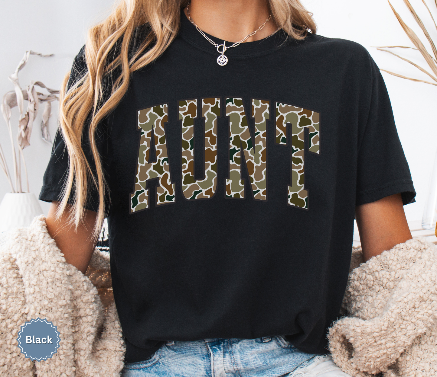 Comfort Colors black t-shirt with duck camo 'AUNT' varsity text.