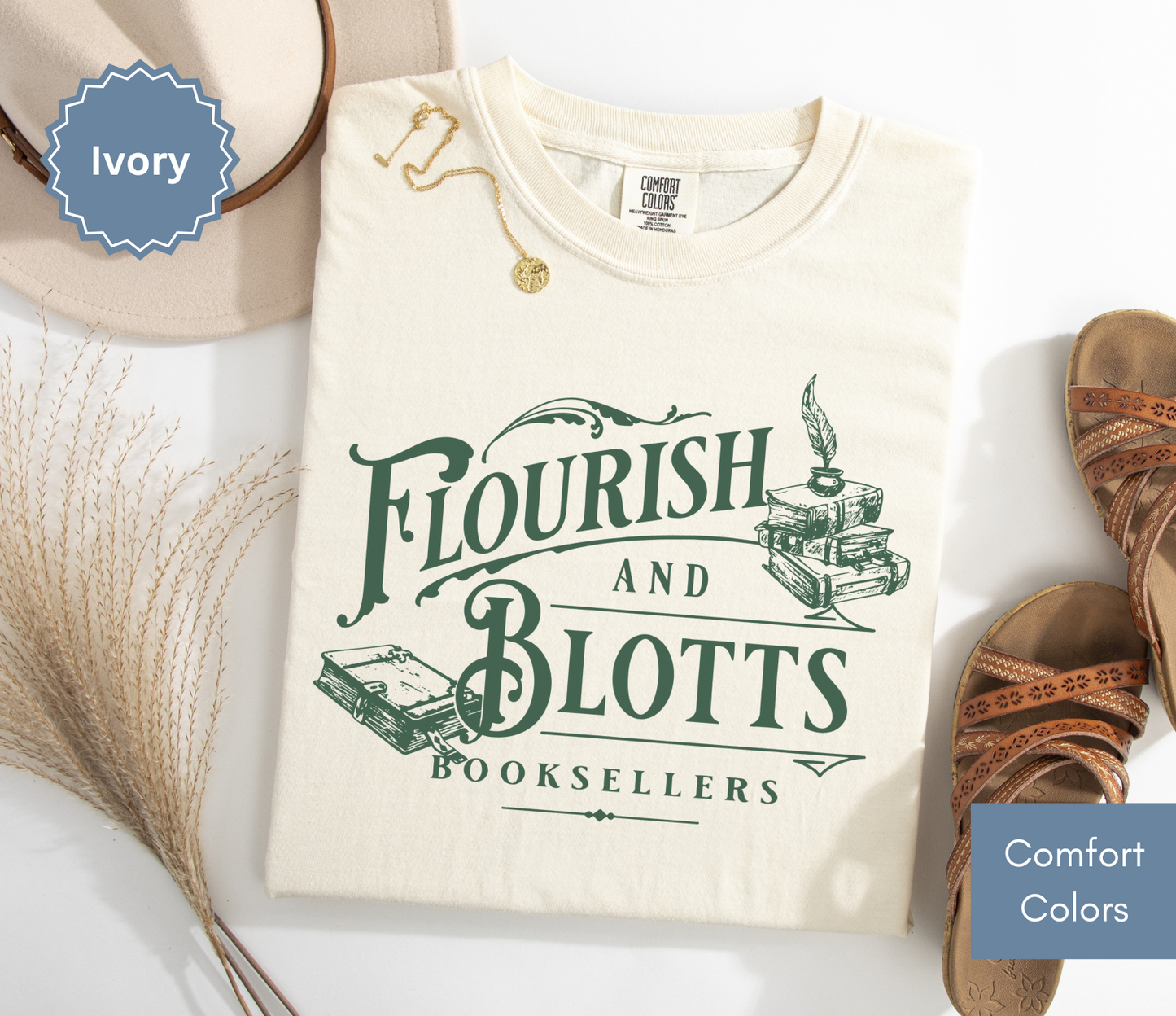 Folded ivory comfort colors t-shirt with 'Flourish and Blotts Booksellers' design on a white background.