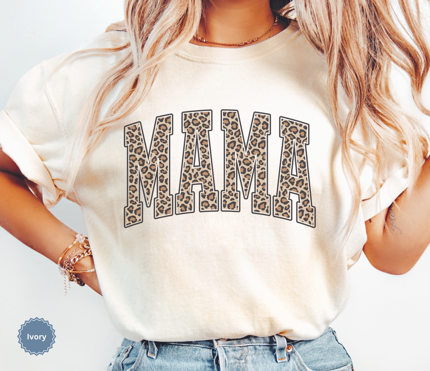Folded ivory comfort colors t-shirt with 'MAMA' in leopard print.
