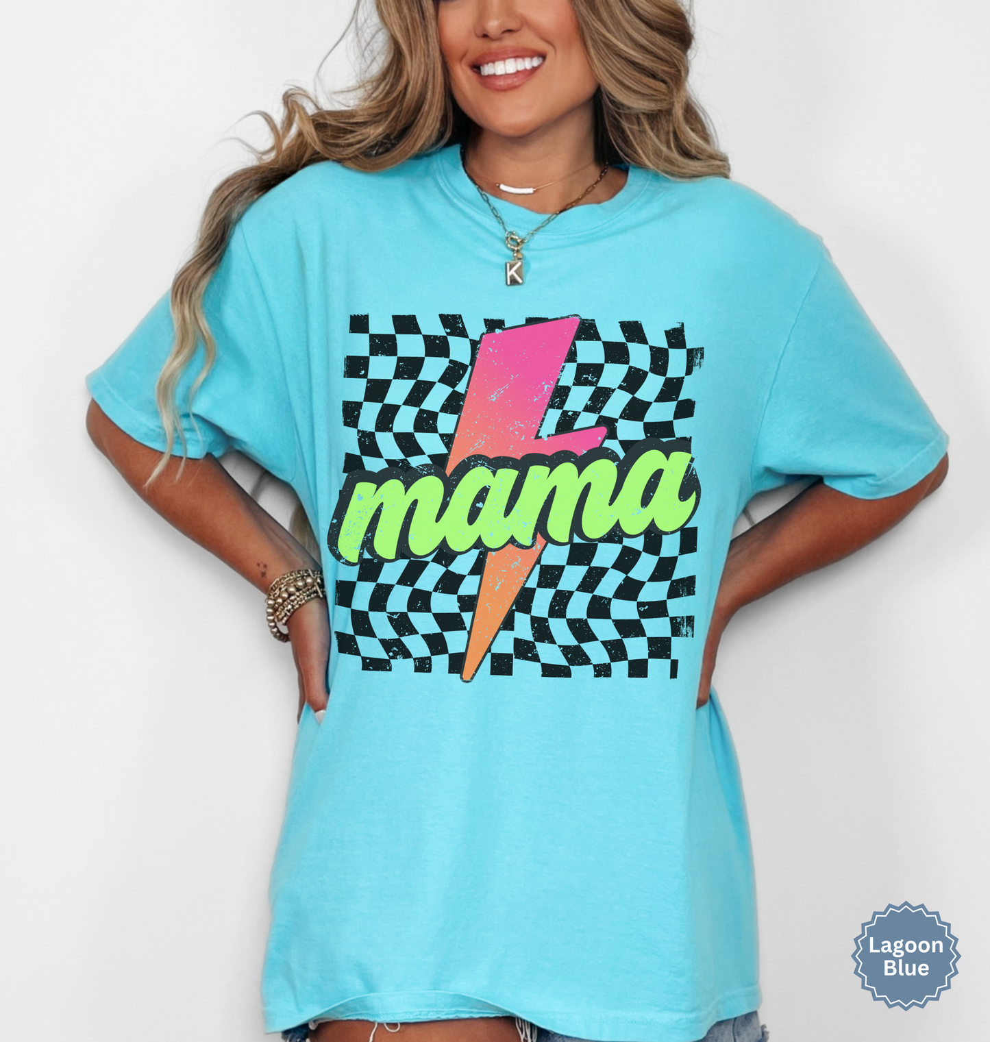 Comfort colors lagoon blue shirt with colorful neon retro checkered pattern and lightning bolt graphics with "MAMA" text.