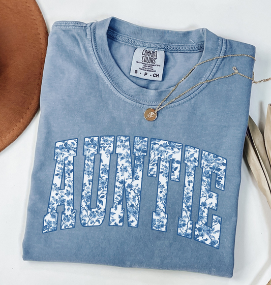 Comfort Colors Blue Jean colored t-shirt with 'AUNTIE' toile chinoiserie varsity text.