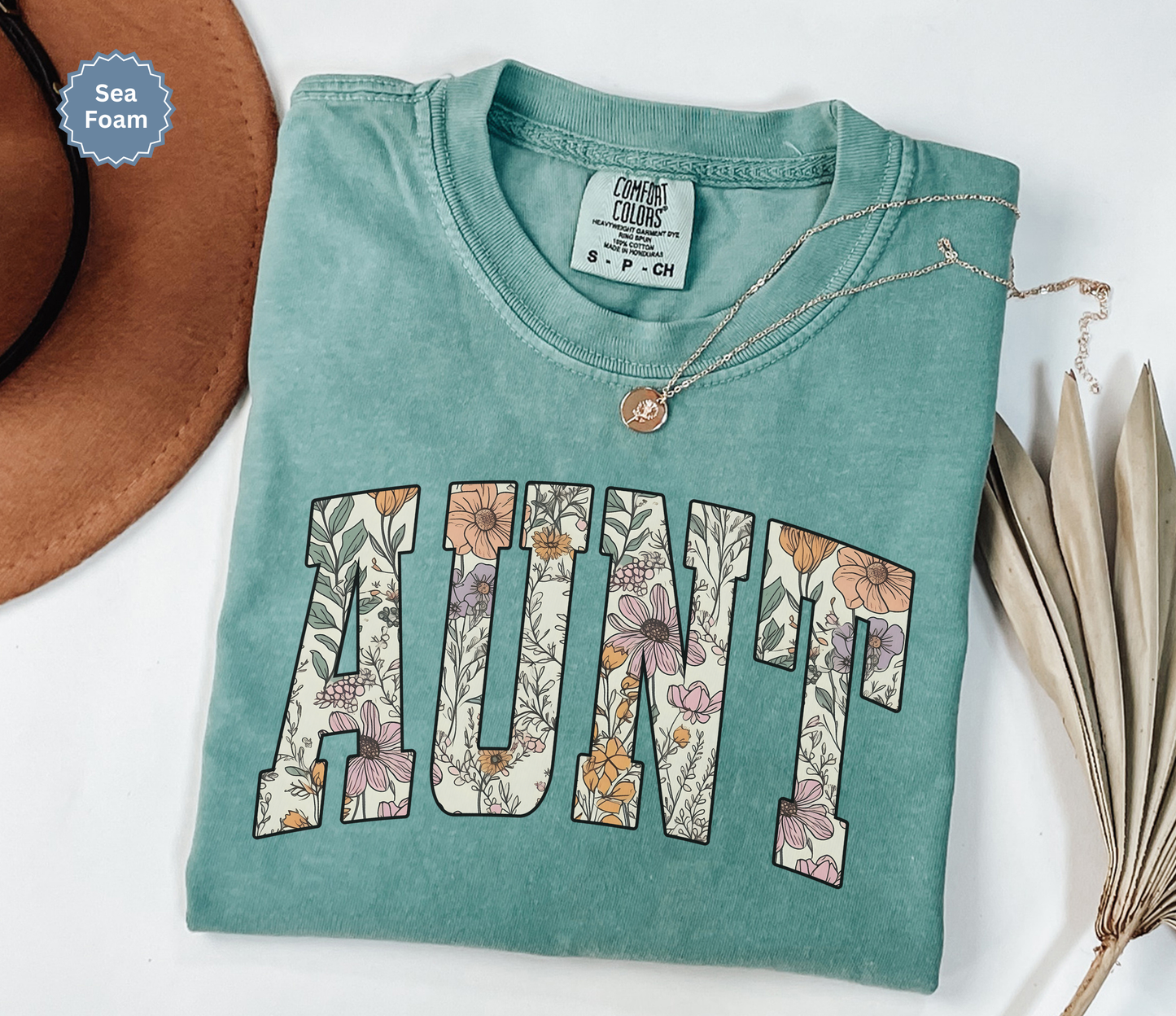 Comfort colors seafoam t-shirt with floral 'AUNT' varsity text